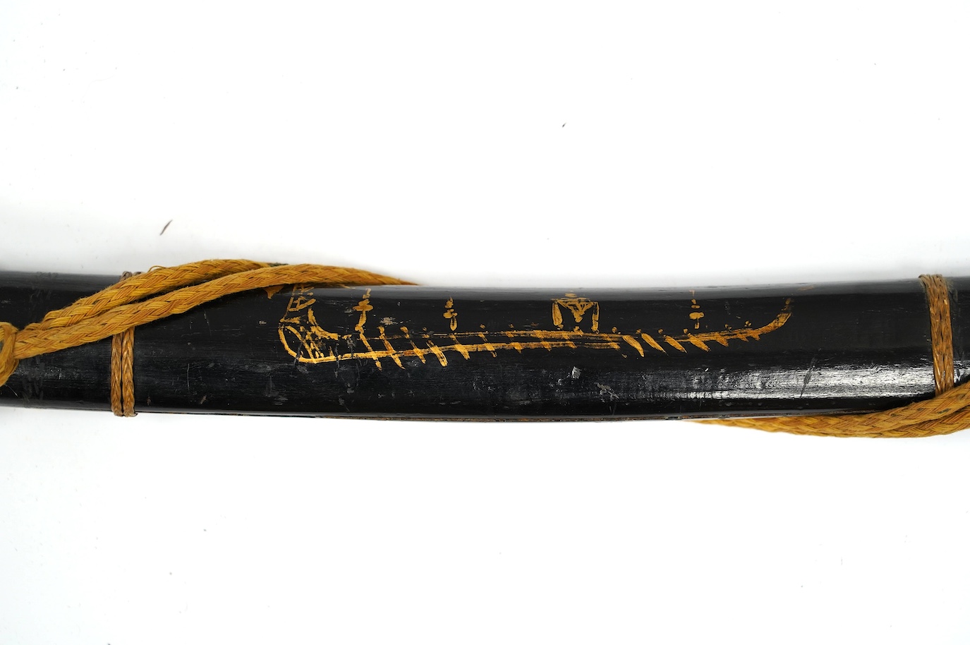 A Thai sword Dha, with a lacquered hilt and wooden scabbard, blade 56cm. Condition - fair